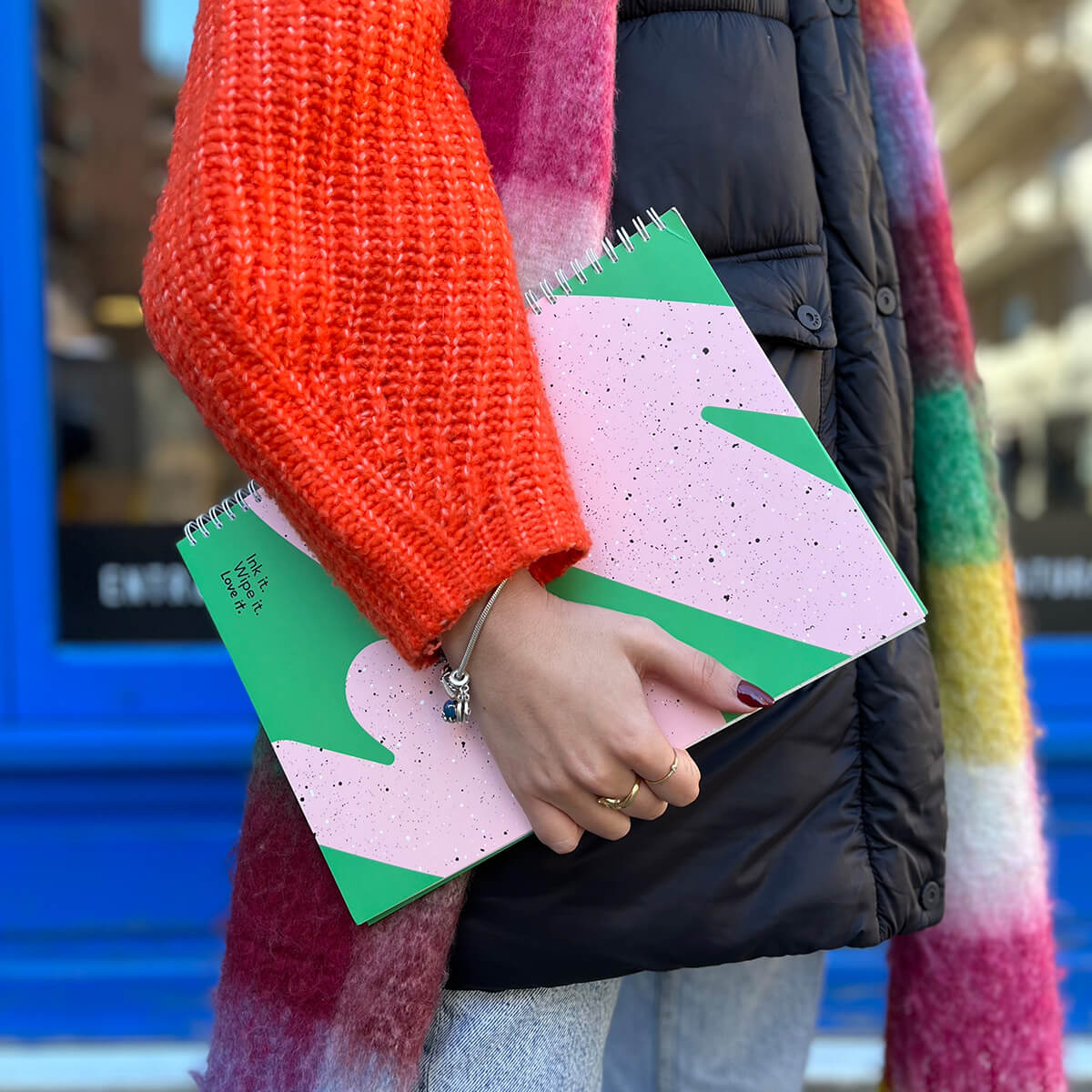 girl-holding-A4-flashy-moss-notebook